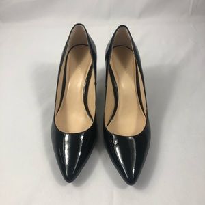 Cole Haan black patent leather gold emblem at the back of the heel 3 inch heel